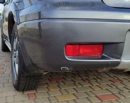 Серый Мицубиси Аутлендер, объемом двигателя 2.38 л и пробегом 189 тыс. км за 7600 $, фото 3 на Automoto.ua