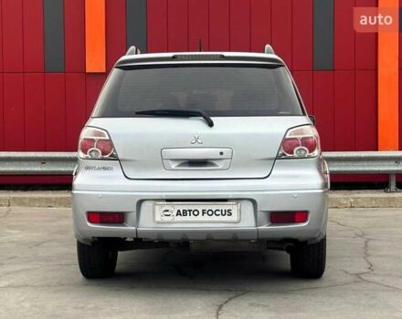 Серый Мицубиси Аутлендер, объемом двигателя 2.38 л и пробегом 245 тыс. км за 5390 $, фото 6 на Automoto.ua
