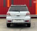 Серый Мицубиси Аутлендер, объемом двигателя 2.38 л и пробегом 245 тыс. км за 5390 $, фото 6 на Automoto.ua
