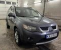Серый Мицубиси Аутлендер, объемом двигателя 2.4 л и пробегом 190 тыс. км за 8000 $, фото 1 на Automoto.ua