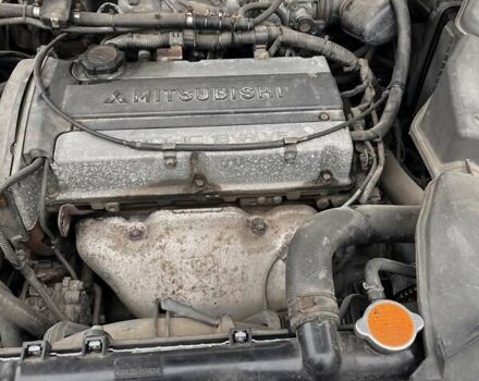 Сірий Міцубісі Аутлендер, об'ємом двигуна 2 л та пробігом 332 тис. км за 6200 $, фото 4 на Automoto.ua