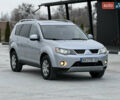 Серый Мицубиси Аутлендер, объемом двигателя 2 л и пробегом 299 тыс. км за 7750 $, фото 2 на Automoto.ua