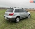 Серый Мицубиси Аутлендер, объемом двигателя 2 л и пробегом 270 тыс. км за 7000 $, фото 3 на Automoto.ua