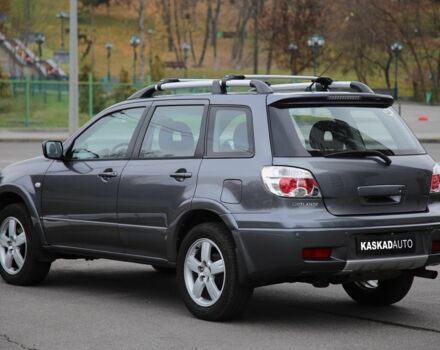 Серый Мицубиси Аутлендер, объемом двигателя 2.4 л и пробегом 240 тыс. км за 7200 $, фото 3 на Automoto.ua