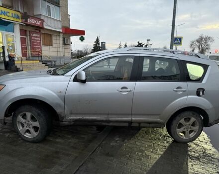 Серый Мицубиси Аутлендер, объемом двигателя 2 л и пробегом 254 тыс. км за 4000 $, фото 2 на Automoto.ua