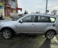 Серый Мицубиси Аутлендер, объемом двигателя 2 л и пробегом 254 тыс. км за 4000 $, фото 2 на Automoto.ua