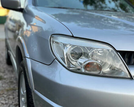 Серый Мицубиси Аутлендер, объемом двигателя 2.38 л и пробегом 238 тыс. км за 7450 $, фото 61 на Automoto.ua