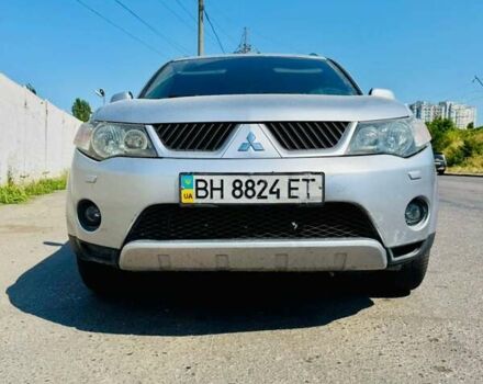 Серый Мицубиси Аутлендер, объемом двигателя 3 л и пробегом 188 тыс. км за 10000 $, фото 2 на Automoto.ua