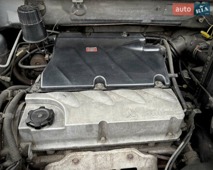 Серый Мицубиси Аутлендер, объемом двигателя 2.38 л и пробегом 238 тыс. км за 7450 $, фото 45 на Automoto.ua