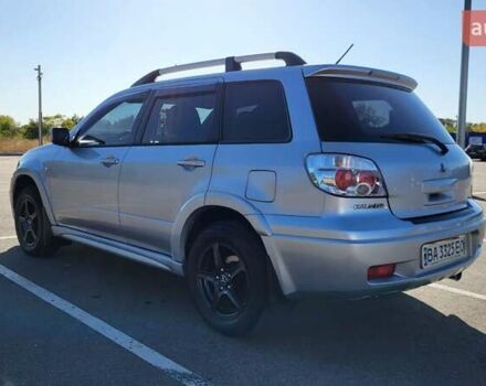Сірий Міцубісі Аутлендер, об'ємом двигуна 2.4 л та пробігом 260 тис. км за 7300 $, фото 1 на Automoto.ua