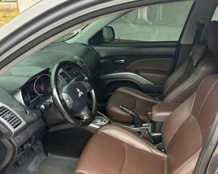 Сірий Міцубісі Аутлендер, об'ємом двигуна 2.36 л та пробігом 380 тис. км за 10000 $, фото 9 на Automoto.ua