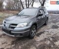Серый Мицубиси Аутлендер, объемом двигателя 2 л и пробегом 163 тыс. км за 7000 $, фото 1 на Automoto.ua
