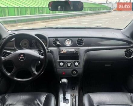 Серый Мицубиси Аутлендер, объемом двигателя 2.38 л и пробегом 245 тыс. км за 5390 $, фото 12 на Automoto.ua