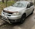 Сірий Міцубісі Аутлендер, об'ємом двигуна 2 л та пробігом 332 тис. км за 6200 $, фото 1 на Automoto.ua