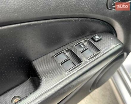 Серый Мицубиси Аутлендер, объемом двигателя 2.4 л и пробегом 245 тыс. км за 6790 $, фото 17 на Automoto.ua