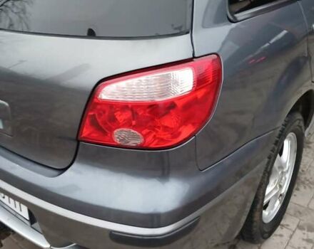 Сірий Міцубісі Аутлендер, об'ємом двигуна 2 л та пробігом 191 тис. км за 6500 $, фото 1 на Automoto.ua