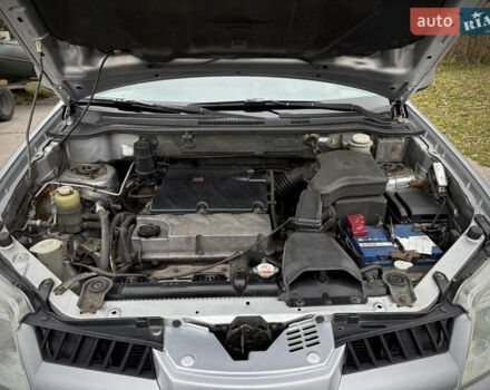 Серый Мицубиси Аутлендер, объемом двигателя 2.38 л и пробегом 238 тыс. км за 7450 $, фото 46 на Automoto.ua