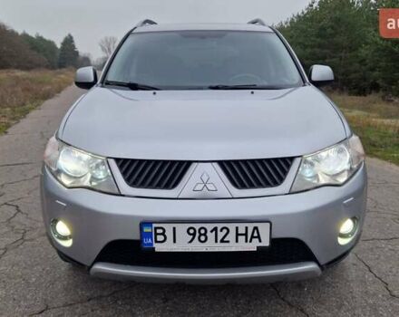 Серый Мицубиси Аутлендер, объемом двигателя 3 л и пробегом 197 тыс. км за 9500 $, фото 8 на Automoto.ua