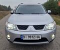 Серый Мицубиси Аутлендер, объемом двигателя 3 л и пробегом 197 тыс. км за 9500 $, фото 8 на Automoto.ua