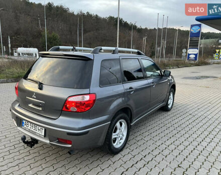 Серый Мицубиси Аутлендер, объемом двигателя 2 л и пробегом 196 тыс. км за 6450 $, фото 13 на Automoto.ua