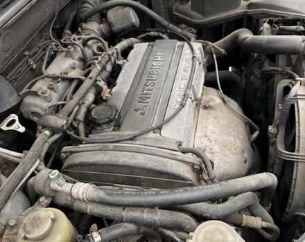 Сірий Міцубісі Аутлендер, об'ємом двигуна 2 л та пробігом 332 тис. км за 6200 $, фото 7 на Automoto.ua