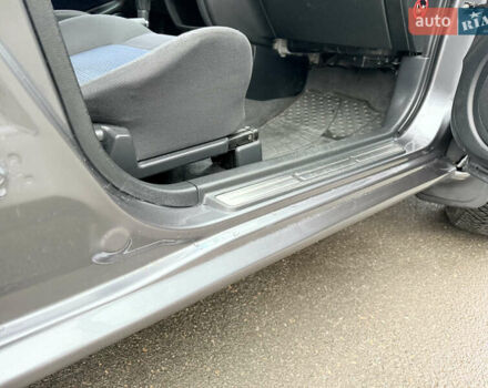 Серый Мицубиси Аутлендер, объемом двигателя 2.4 л и пробегом 240 тыс. км за 6900 $, фото 28 на Automoto.ua