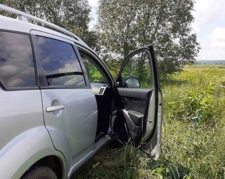 Серый Мицубиси Аутлендер, объемом двигателя 2.2 л и пробегом 207 тыс. км за 8000 $, фото 6 на Automoto.ua