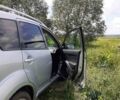 Серый Мицубиси Аутлендер, объемом двигателя 2.2 л и пробегом 207 тыс. км за 8000 $, фото 6 на Automoto.ua