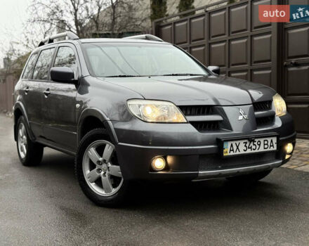 Серый Мицубиси Аутлендер, объемом двигателя 2.4 л и пробегом 240 тыс. км за 6900 $, фото 37 на Automoto.ua