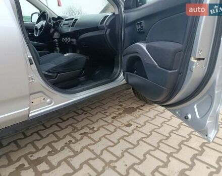 Серый Мицубиси Аутлендер, объемом двигателя 2 л и пробегом 332 тыс. км за 7650 $, фото 36 на Automoto.ua