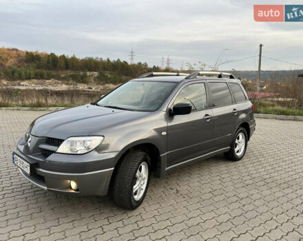 Сірий Міцубісі Аутлендер, об'ємом двигуна 2 л та пробігом 192 тис. км за 6400 $, фото 2 на Automoto.ua