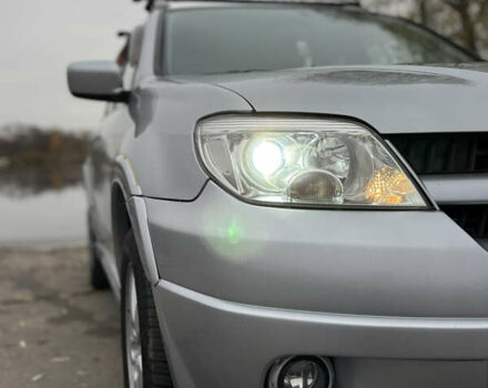 Серый Мицубиси Аутлендер, объемом двигателя 2.38 л и пробегом 238 тыс. км за 7450 $, фото 10 на Automoto.ua