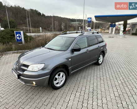 Сірий Міцубісі Аутлендер, об'ємом двигуна 2 л та пробігом 192 тис. км за 6400 $, фото 8 на Automoto.ua