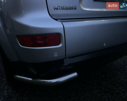 Серый Мицубиси Аутлендер, объемом двигателя 2.4 л и пробегом 236 тыс. км за 7600 $, фото 56 на Automoto.ua