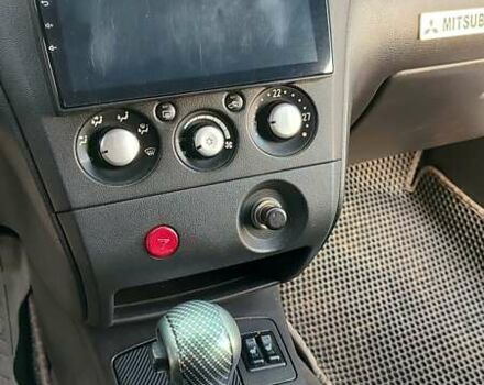 Серый Мицубиси Аутлендер, объемом двигателя 2.38 л и пробегом 189 тыс. км за 7600 $, фото 7 на Automoto.ua