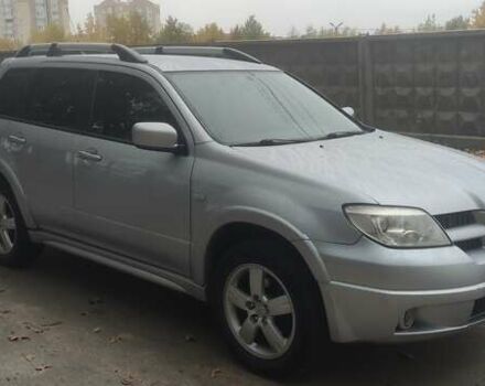 Сірий Міцубісі Аутлендер, об'ємом двигуна 2.38 л та пробігом 200 тис. км за 6550 $, фото 2 на Automoto.ua