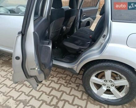 Серый Мицубиси Аутлендер, объемом двигателя 2 л и пробегом 332 тыс. км за 7650 $, фото 22 на Automoto.ua