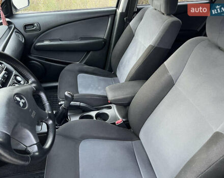 Серый Мицубиси Аутлендер, объемом двигателя 2 л и пробегом 196 тыс. км за 6450 $, фото 27 на Automoto.ua