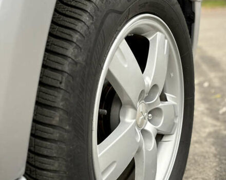 Серый Мицубиси Аутлендер, объемом двигателя 2.38 л и пробегом 238 тыс. км за 7450 $, фото 33 на Automoto.ua