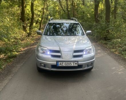 Сірий Міцубісі Аутлендер, об'ємом двигуна 2.4 л та пробігом 307 тис. км за 6700 $, фото 1 на Automoto.ua
