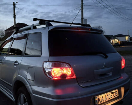 Серый Мицубиси Аутлендер, объемом двигателя 2.38 л и пробегом 238 тыс. км за 7450 $, фото 56 на Automoto.ua