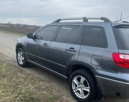 Сірий Міцубісі Аутлендер, об'ємом двигуна 2 л та пробігом 285 тис. км за 7300 $, фото 2 на Automoto.ua