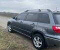 Сірий Міцубісі Аутлендер, об'ємом двигуна 2 л та пробігом 285 тис. км за 7300 $, фото 2 на Automoto.ua