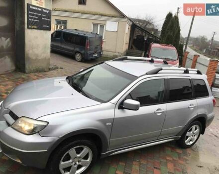 Сірий Міцубісі Аутлендер, об'ємом двигуна 2.4 л та пробігом 167 тис. км за 6400 $, фото 2 на Automoto.ua