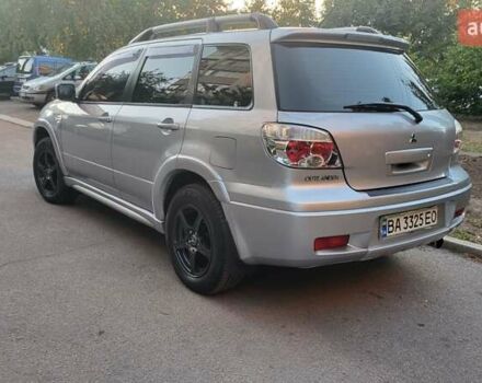 Сірий Міцубісі Аутлендер, об'ємом двигуна 2.4 л та пробігом 260 тис. км за 7300 $, фото 7 на Automoto.ua