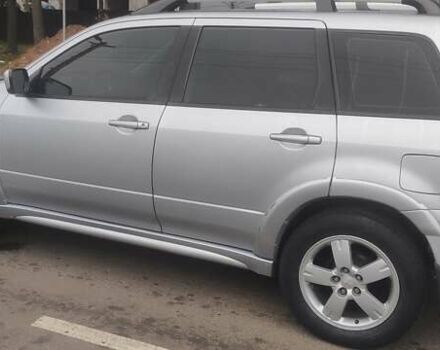 Сірий Міцубісі Аутлендер, об'ємом двигуна 2.38 л та пробігом 200 тис. км за 6550 $, фото 4 на Automoto.ua