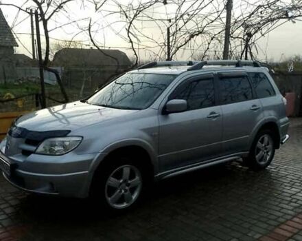 Сірий Міцубісі Аутлендер, об'ємом двигуна 2 л та пробігом 268 тис. км за 7500 $, фото 1 на Automoto.ua