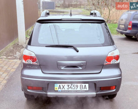 Серый Мицубиси Аутлендер, объемом двигателя 2.4 л и пробегом 240 тыс. км за 6900 $, фото 56 на Automoto.ua