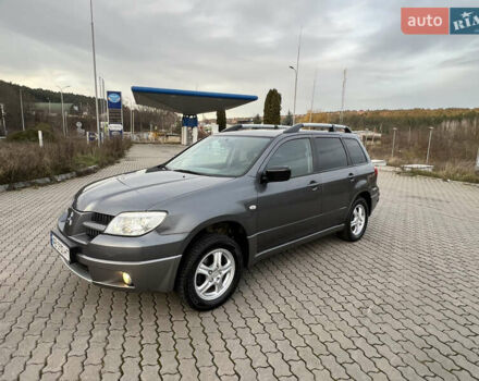 Сірий Міцубісі Аутлендер, об'ємом двигуна 2 л та пробігом 192 тис. км за 6400 $, фото 1 на Automoto.ua