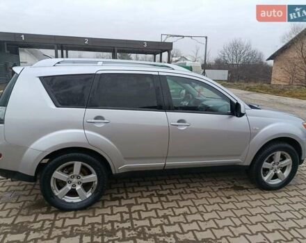 Серый Мицубиси Аутлендер, объемом двигателя 2 л и пробегом 332 тыс. км за 7650 $, фото 34 на Automoto.ua